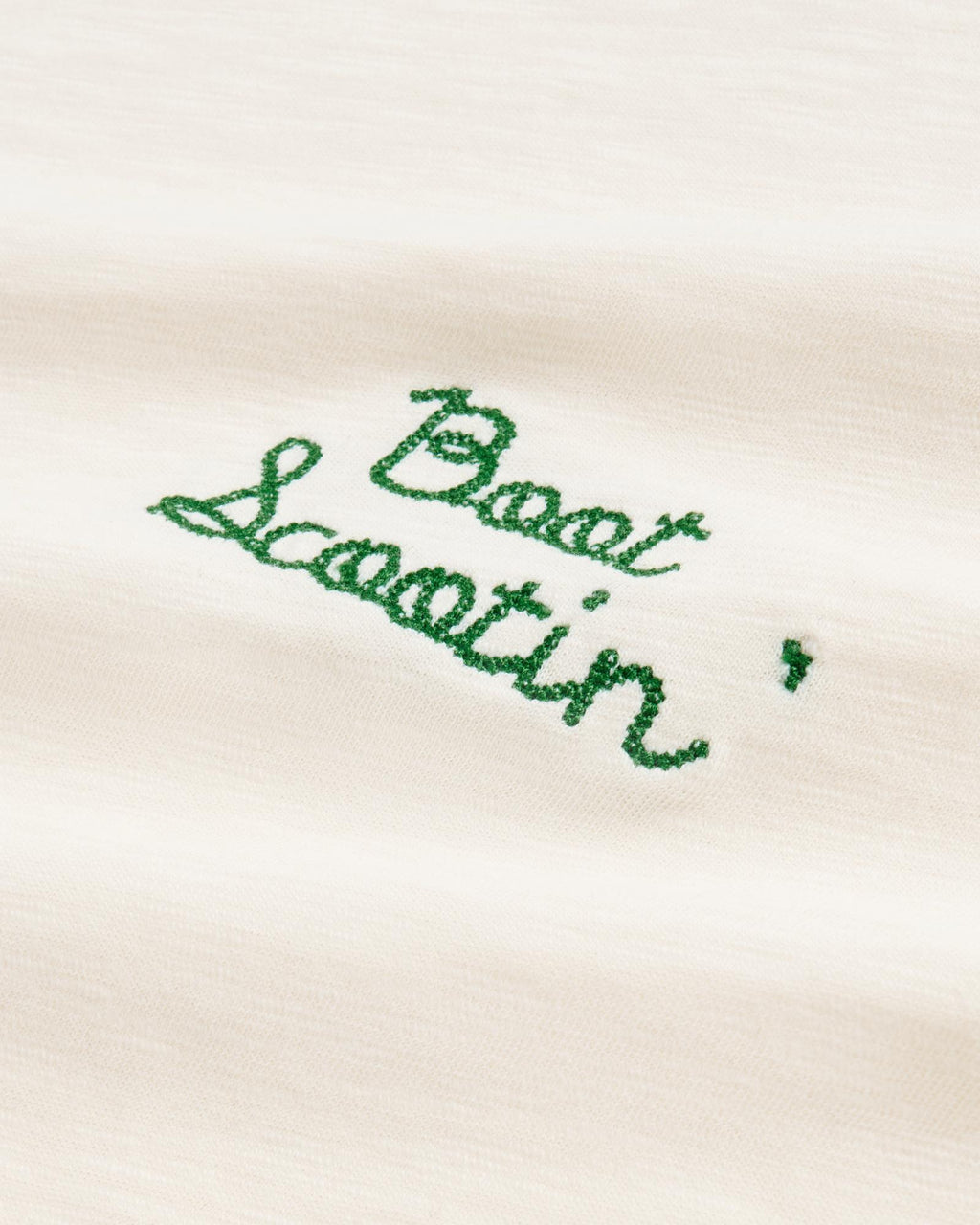 Closeup view of Women's Vintage Ringer Tee - Bone / Green