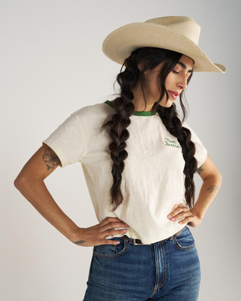 Front view of Women's Vintage Ringer Tee - Bone / Green on model