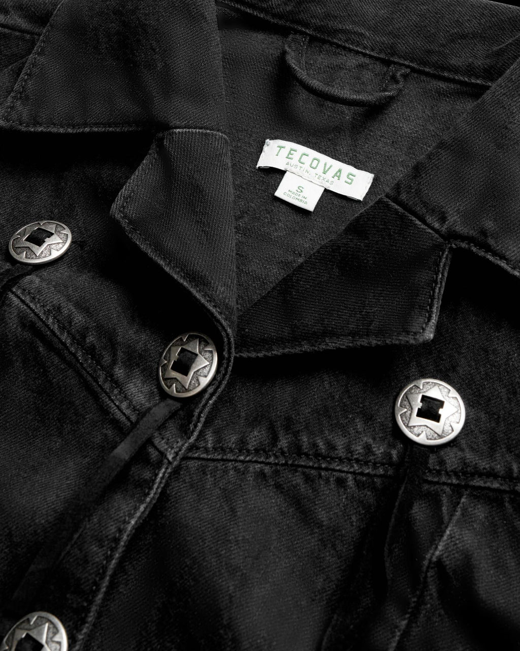 Closeup detail view of Women's Rodeo Concho Denim Jacket - Black