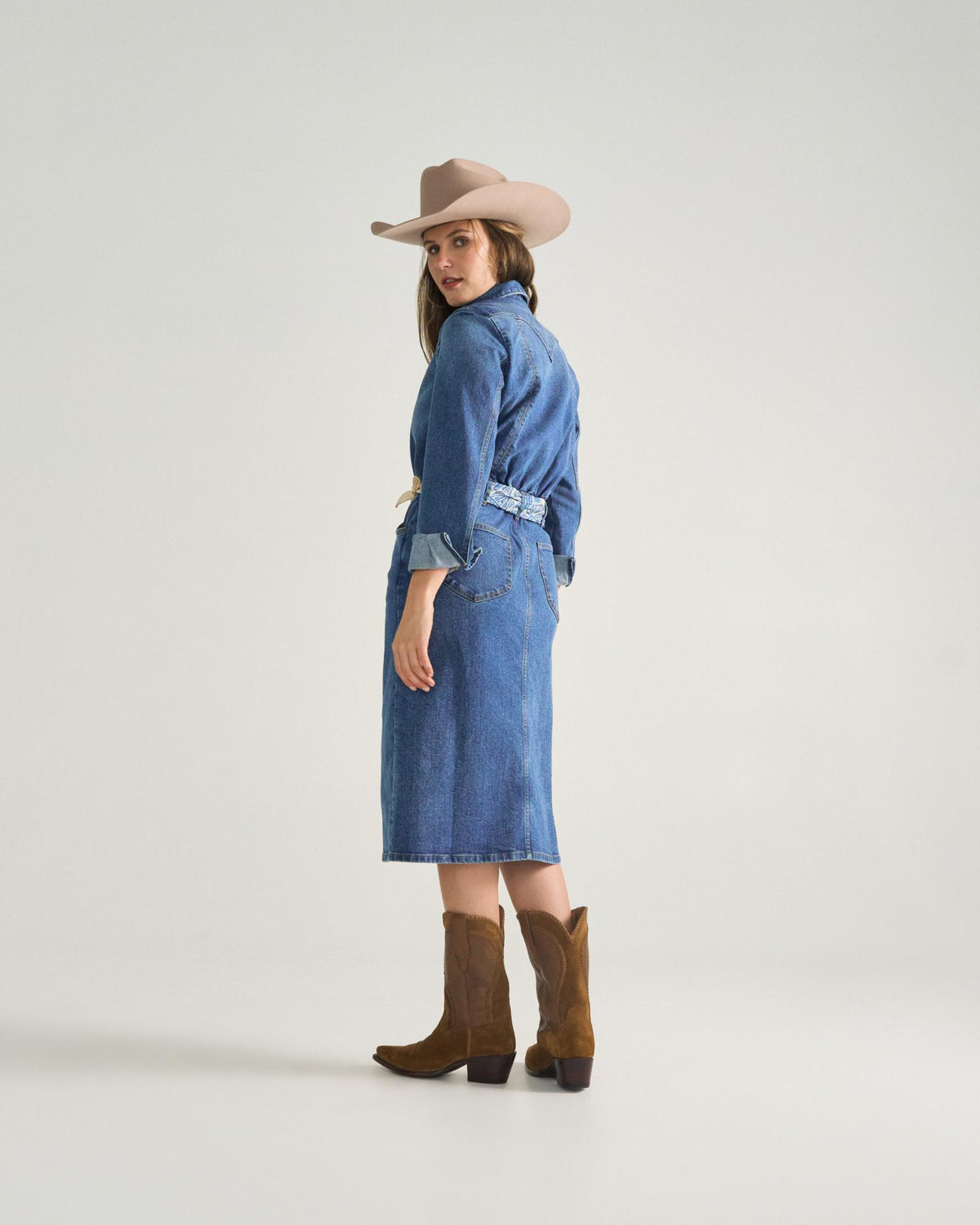 Full view of Women's L/S Denim Midi Dress - Medium Wash on model
