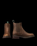 The Chelsea in Cafe Cowhide. Pair of brown leather Chelsea boots crafted from premium Cafe Cowhide with elastic side panels, front and side view shown, featuring pull tabs and low heels.