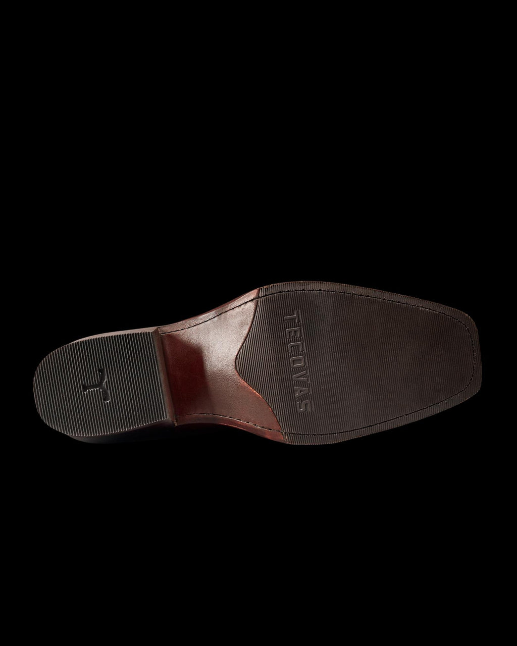 Bottom view of The Charlie Cowhide men’s dress shoe with a square toe, textured sole, and the word “STACY ADAMS” embossed near the arch, expertly crafted from luxurious scarlet cowhide.