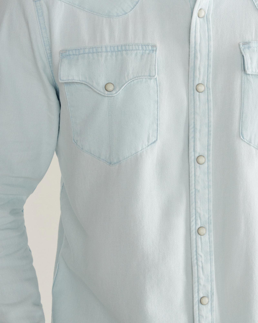 Closeup detail view of Men's Denim Long Sleeve Pearl Snap - Ultra Light