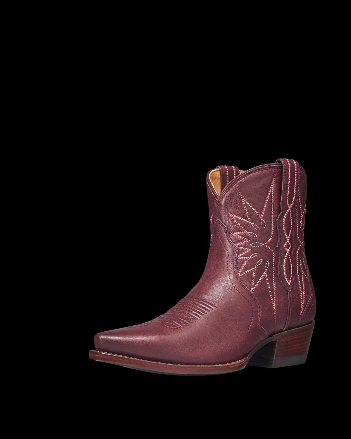 Quarterfront view of The Lynn - Wine Cowhide on plain background