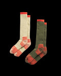 Two pairs of knee-high socks with red accents; one pair is cream with red details, and the other is olive green with red details, both displayed side by side on a black background.