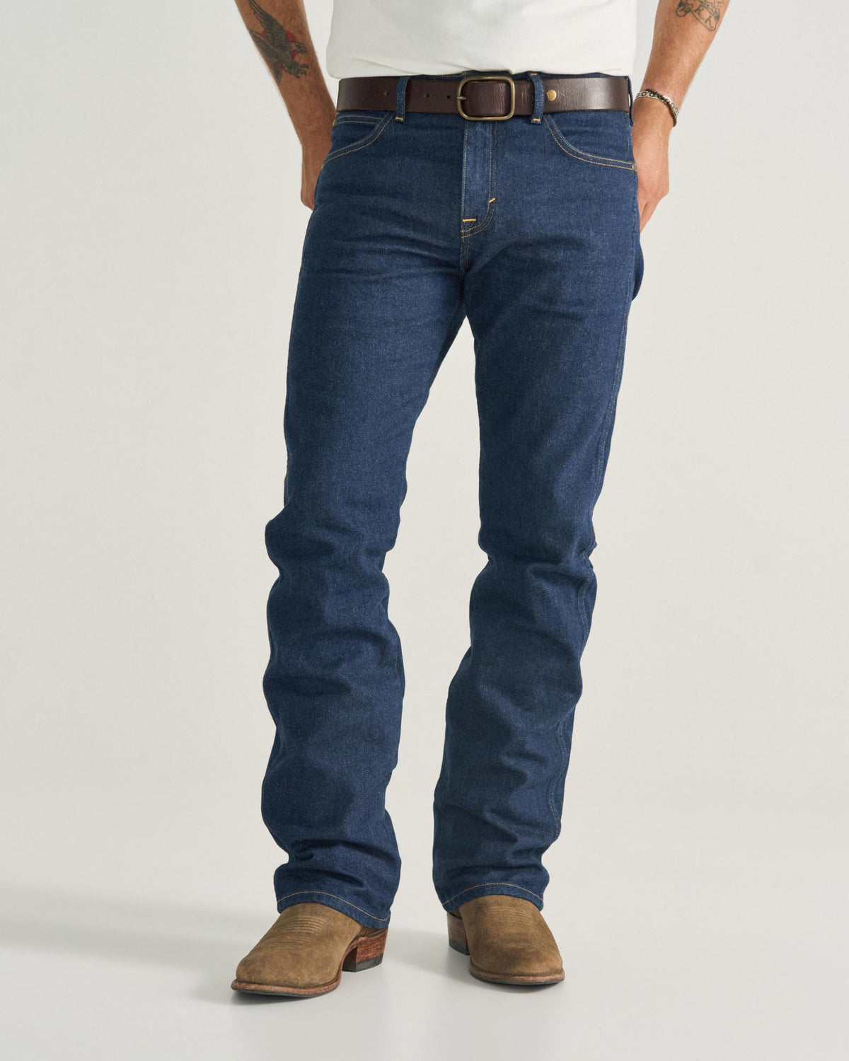 Front view of Men's Modern Bootcut Heritage Denim - Dark Blue on model