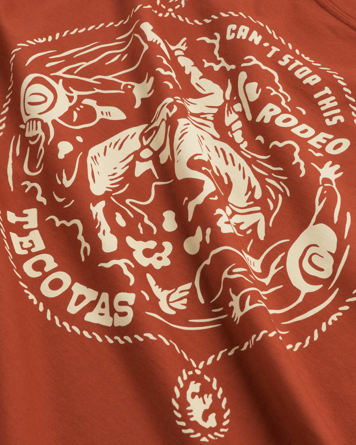 Closeup detail view of Men's Can't Stop Pocket T-Shirt - Orange Rust/Bone