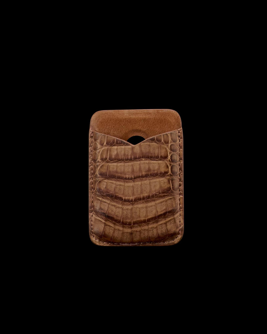 Brown leather card holder with a crocodile pattern, featuring a single pocket and a curved cutout at the top, displayed on a plain white background.