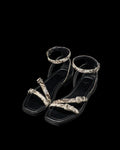 Quarterfront view of The Blakely - Black/Bone on plain background