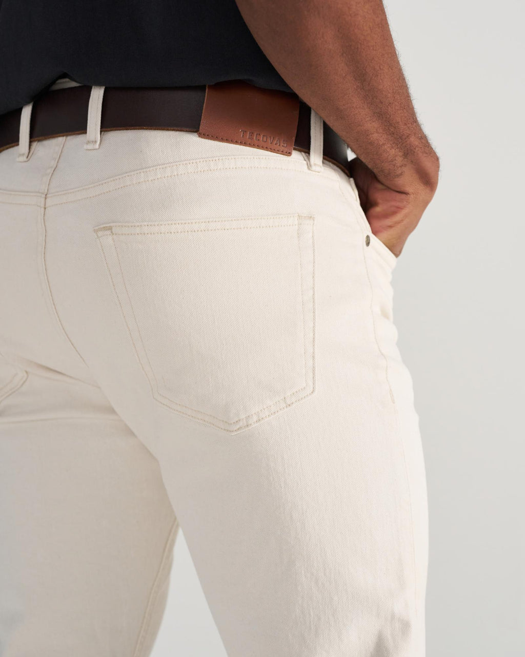 Back view of Men's Slim Stretch Twill - Light Sand on model