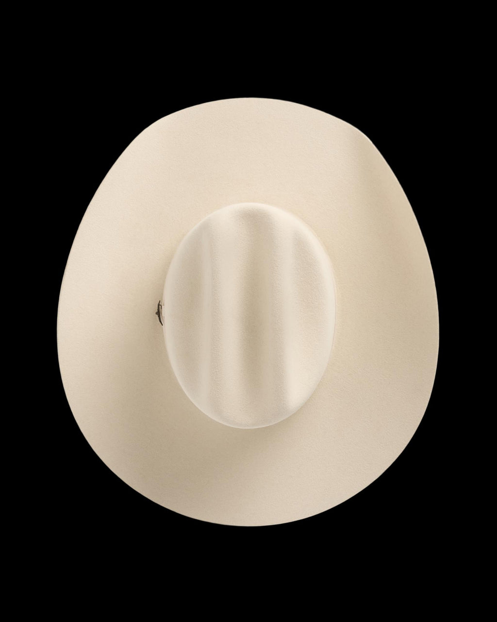 Beige wide-brimmed felt hat photographed from above against a white background.