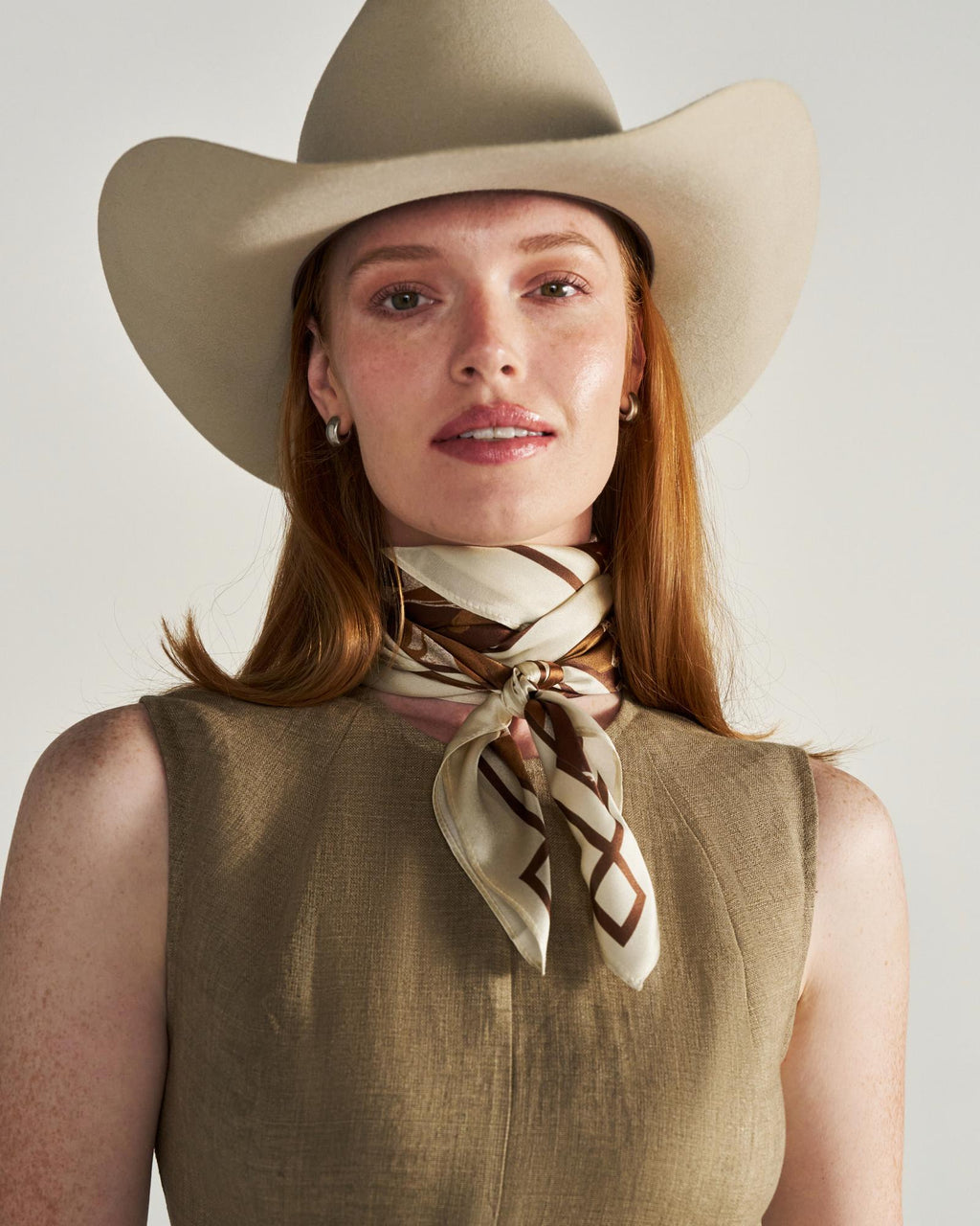 Closeup detail view of Running Horses Wild Rag - Brown Multi