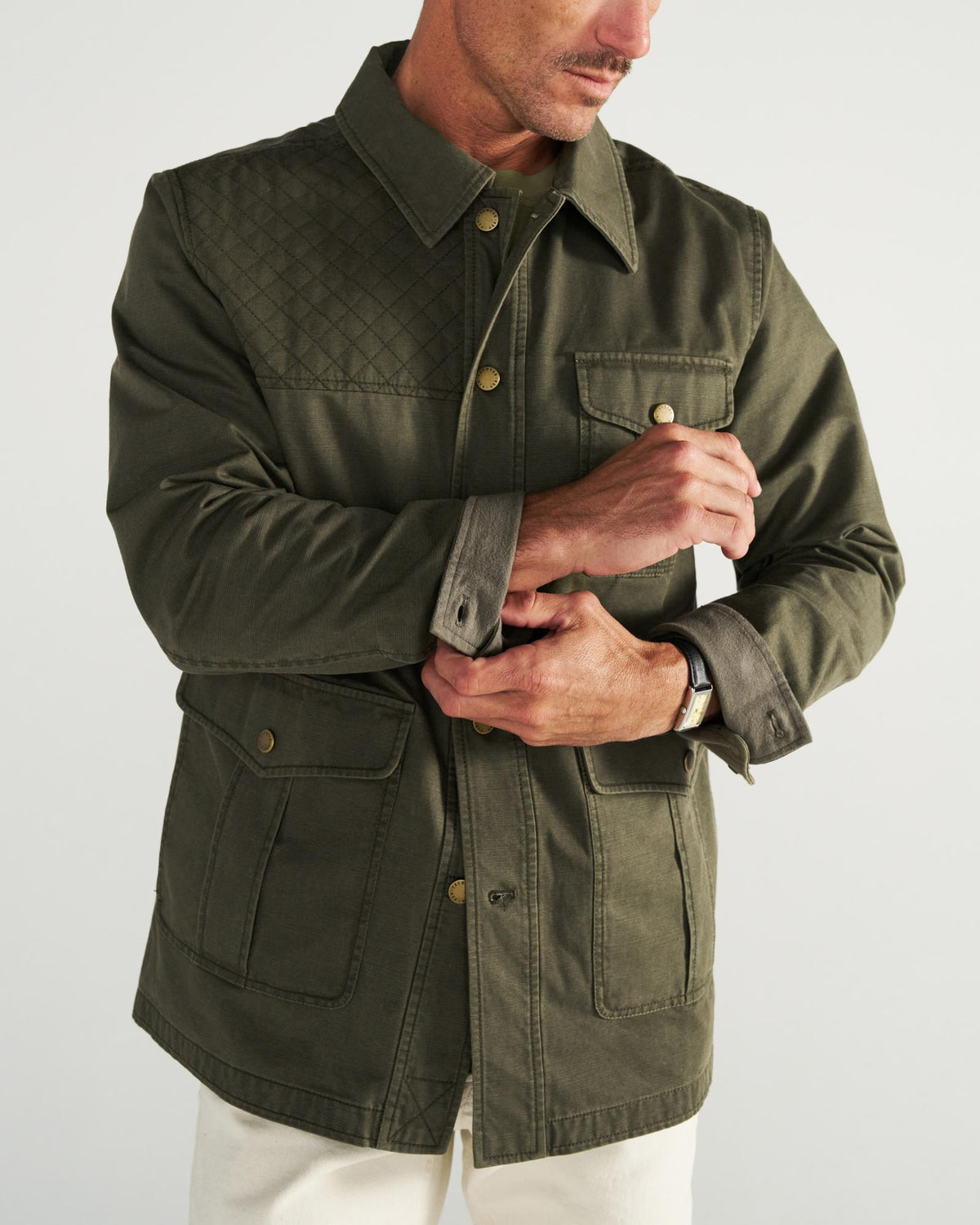 Front view of Men's Field Jacket - Dark Olive on model