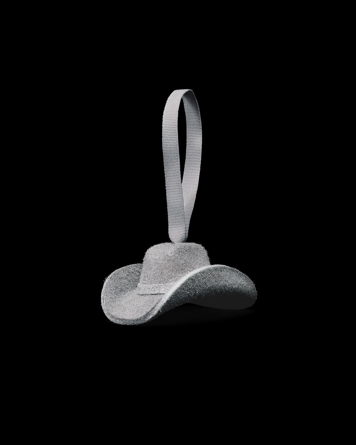 Quarterfront view of Cattleman Hat Ornament - Silver on plain background