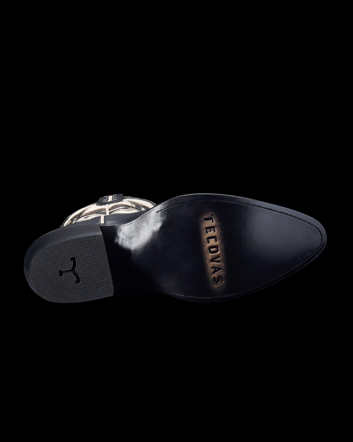 Sole view of The Jolene - Midnight / Bone on plain background