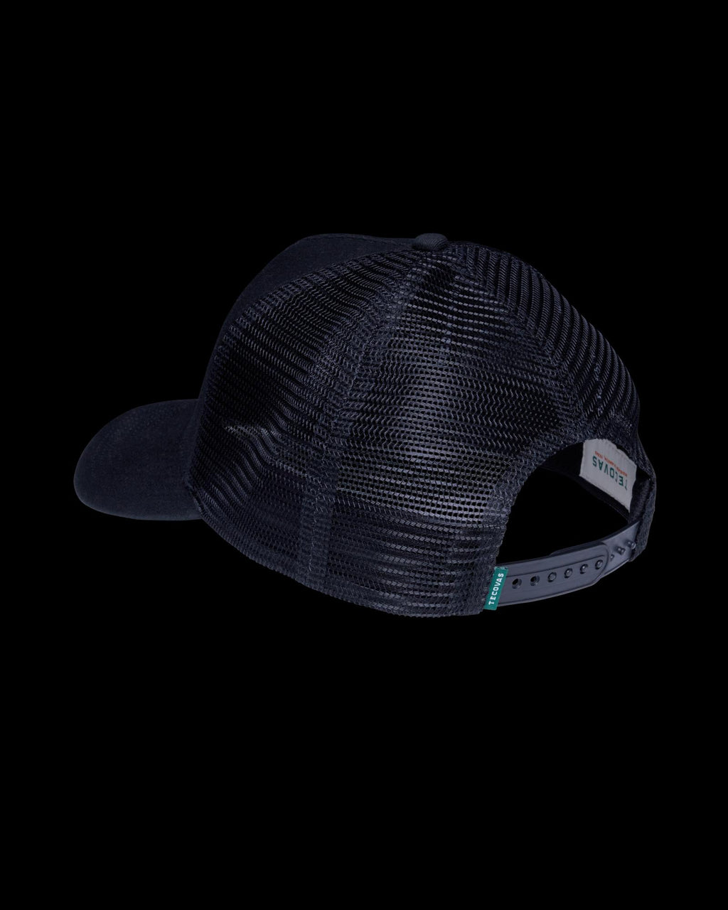 Quarterback view of Quality Made Trucker Hat - Black/Orange on plain background
