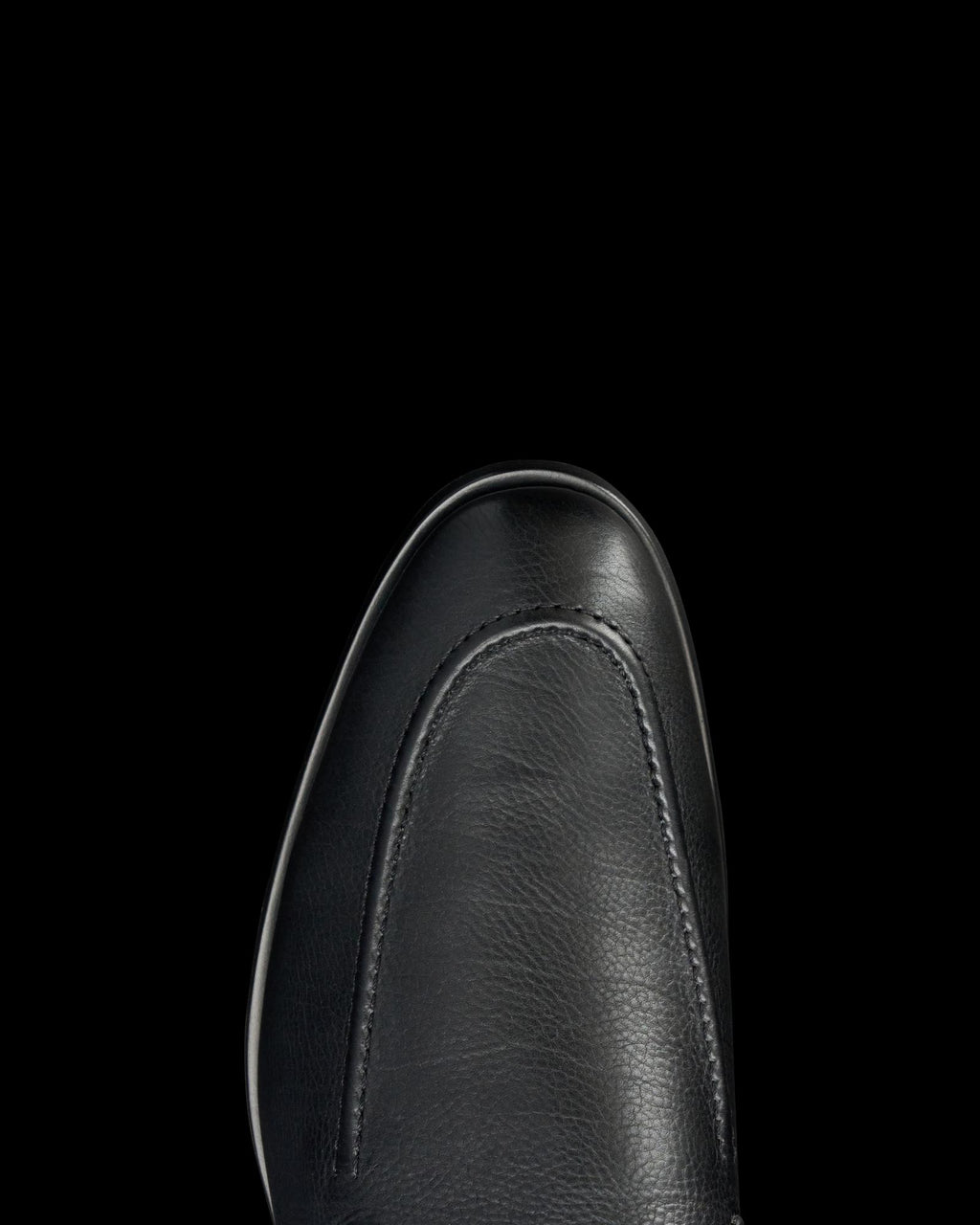 Toe view of The Bennett - Midnight on plain background