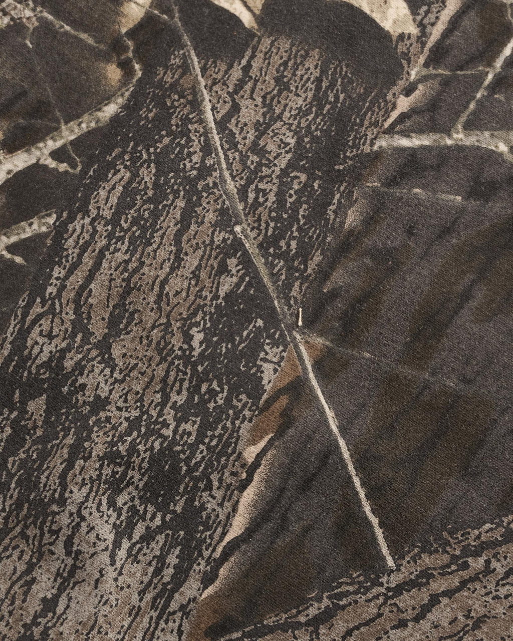 Closeup view of Men's Tecovas x Mossy Oak Waxed Ranch Jacket - Original Bottomland