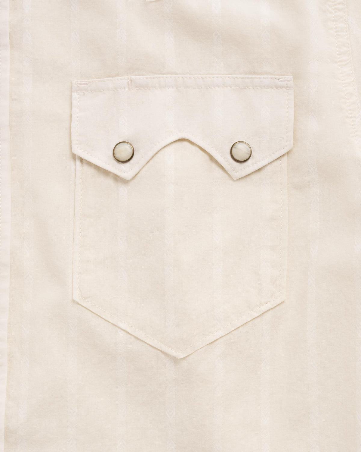 Closeup detail view of Men's Vintage Weight Short Sleeve Pearl Snap - Light Sand/Multi