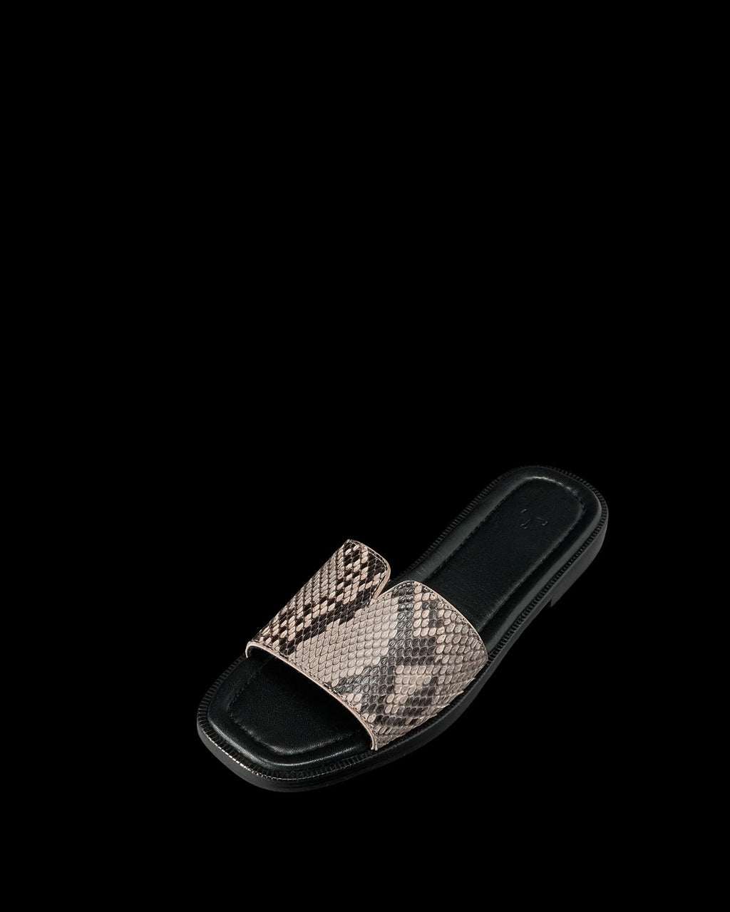 Quarterfront view of The Carmen - Black/Bone on plain background