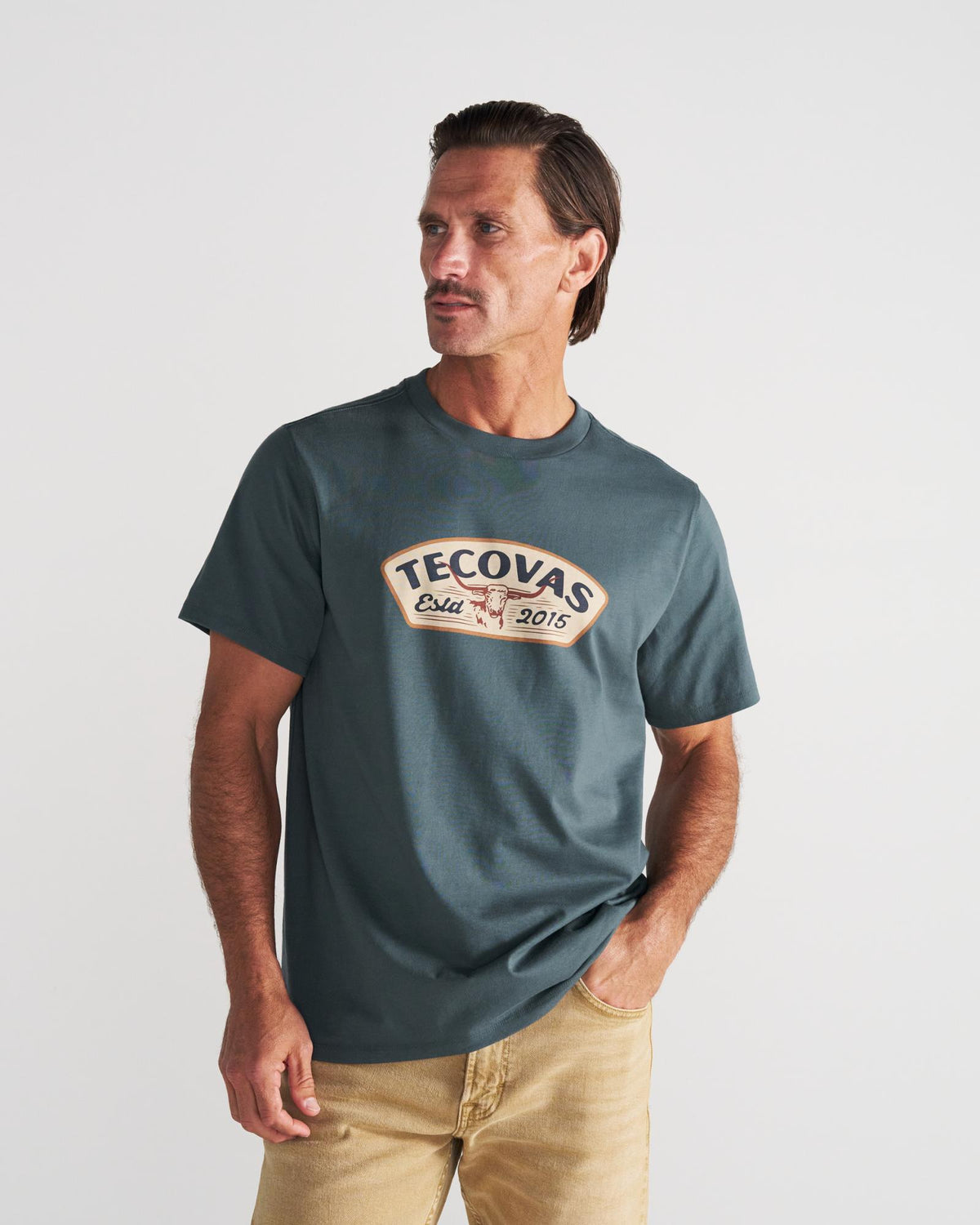 Front view of Men's Longhorn Badge T-Shirt - Dark Slate on model