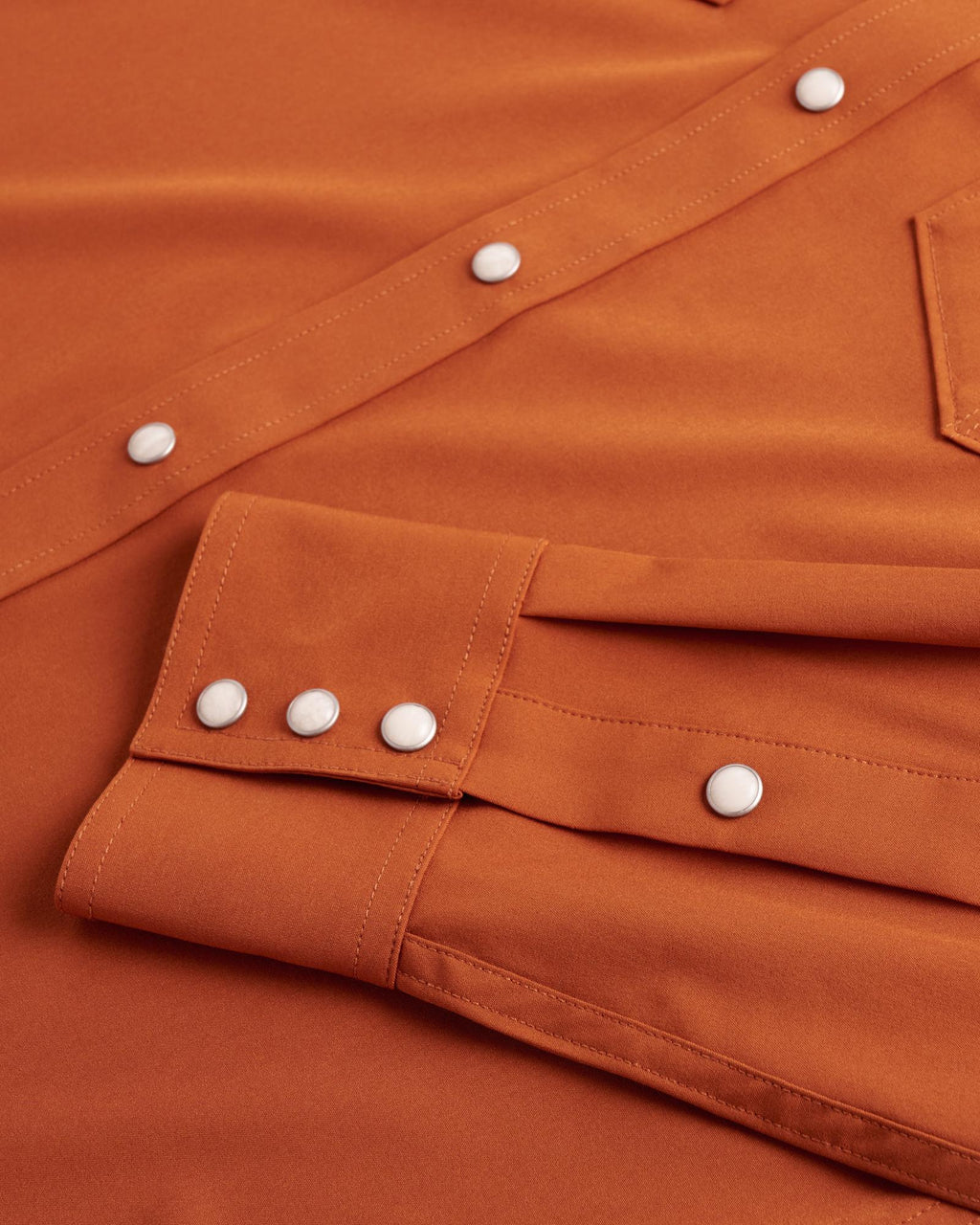 Closeup detail view of Men's Performance Western Pearl Snap - Burnt Orange