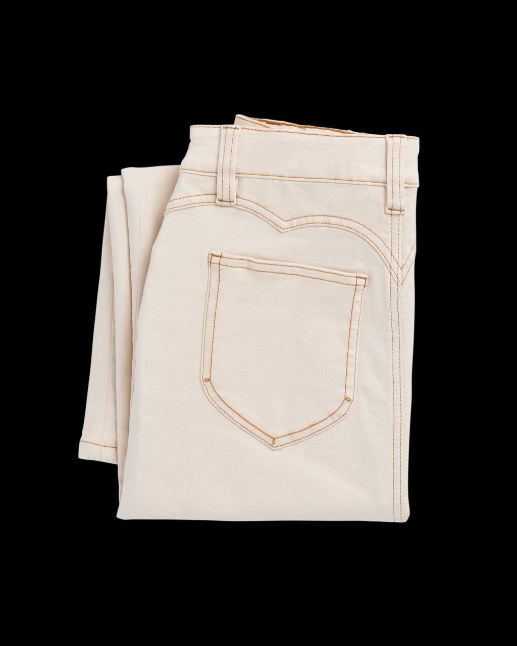 Folded pair of off-white jeans with visible brown stitching on the pocket, placed on a white background.