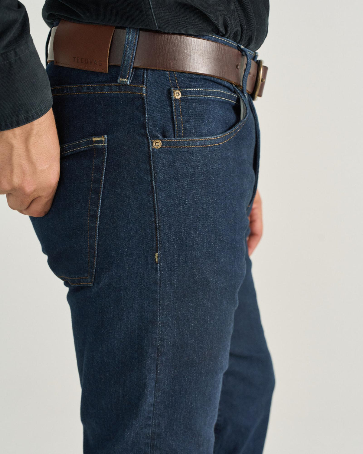Front view of Men's Slim Straight Stretch Denim - Dark Indigo on model