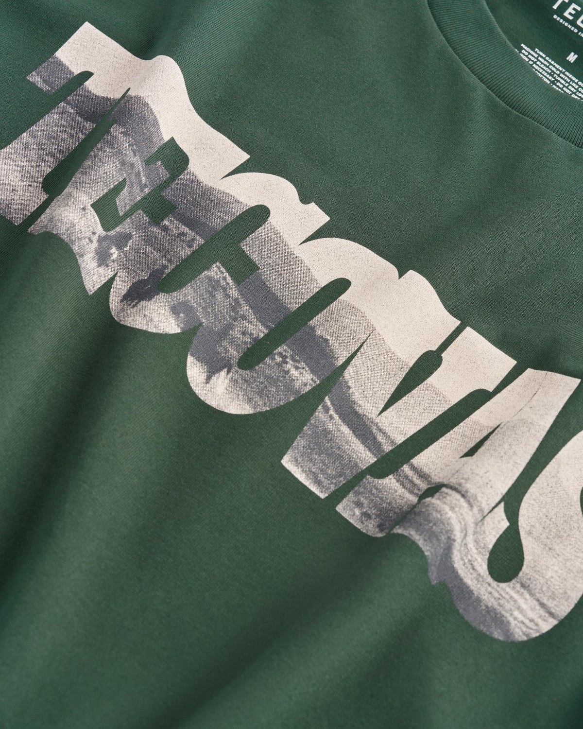 Closeup view of Men's Letter Fill T-Shirt - Hunter Green