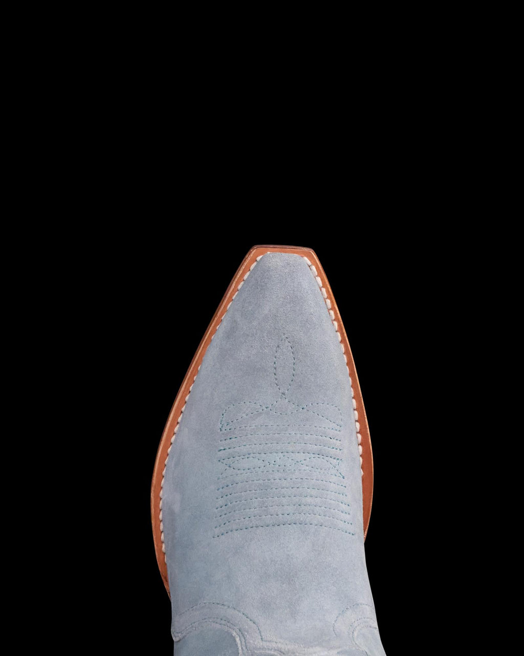 Toe view of The Loretta - Chambray Suede on plain background