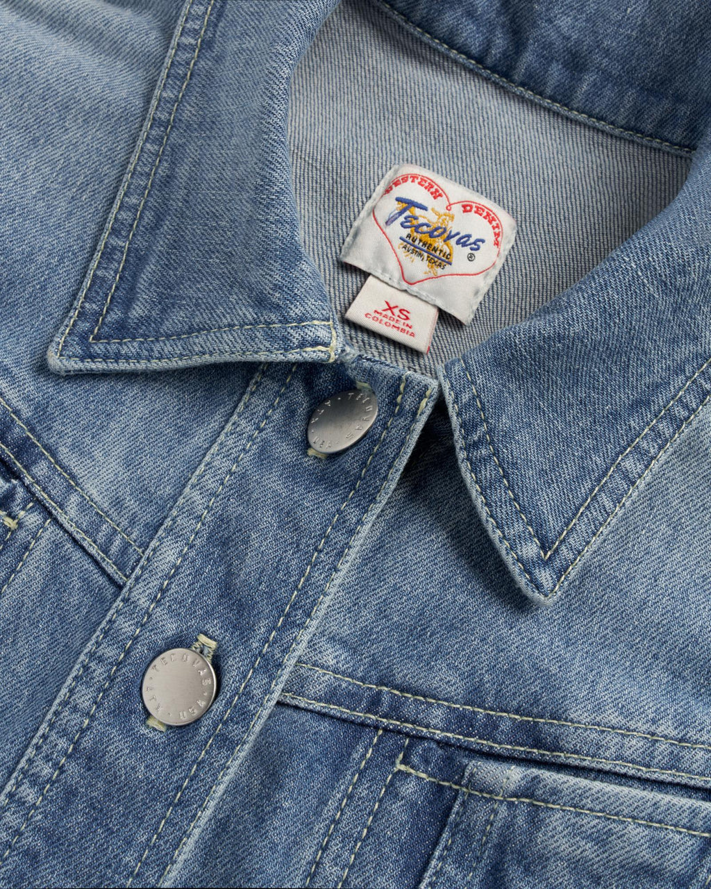 Closeup detail view of Women's Short Sleeve Denim Top - Light Wash