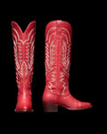 The Abby Wide Calf in Crimson Cowhide. A pair of tall Crimson Cowhide cowboy boots with white decorative stitching and angled heels, shown from the front and side on a white background.