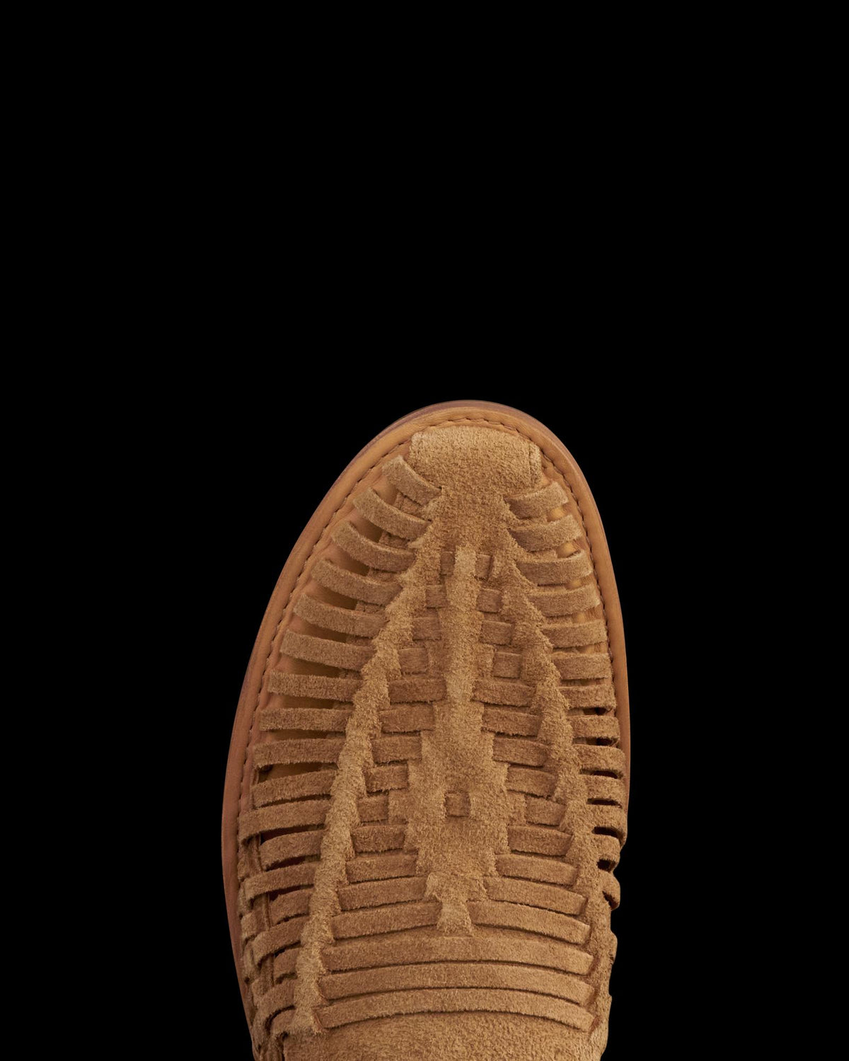 Toe view of The Mateo - Caramel on plain background