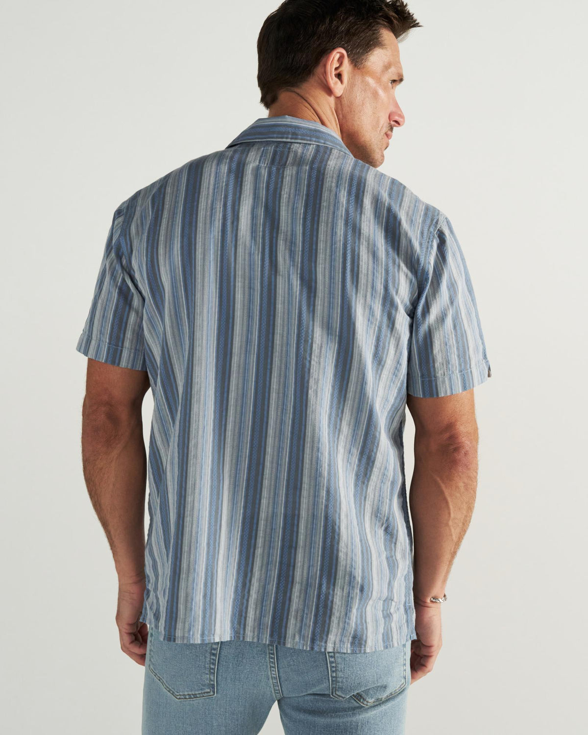 Back view of Men's Dobby Camp Shirt - Atlantic/Chambray on model