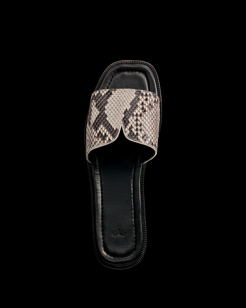 Full view of The Carmen - Black/Bone on plain background