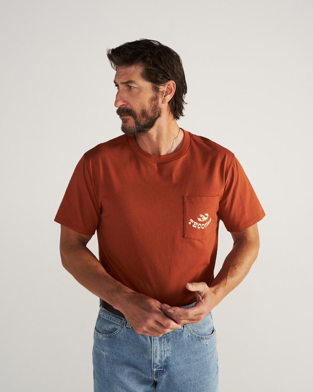 Closeup detail view of Men's Can't Stop Pocket T-Shirt - Orange Rust/Bone