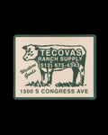Illustration of a cow with text "Tecovas Ranch Supply," a phone number, and "1500 S Congress Ave" on a rectangular sign, styled with a vintage Western theme.