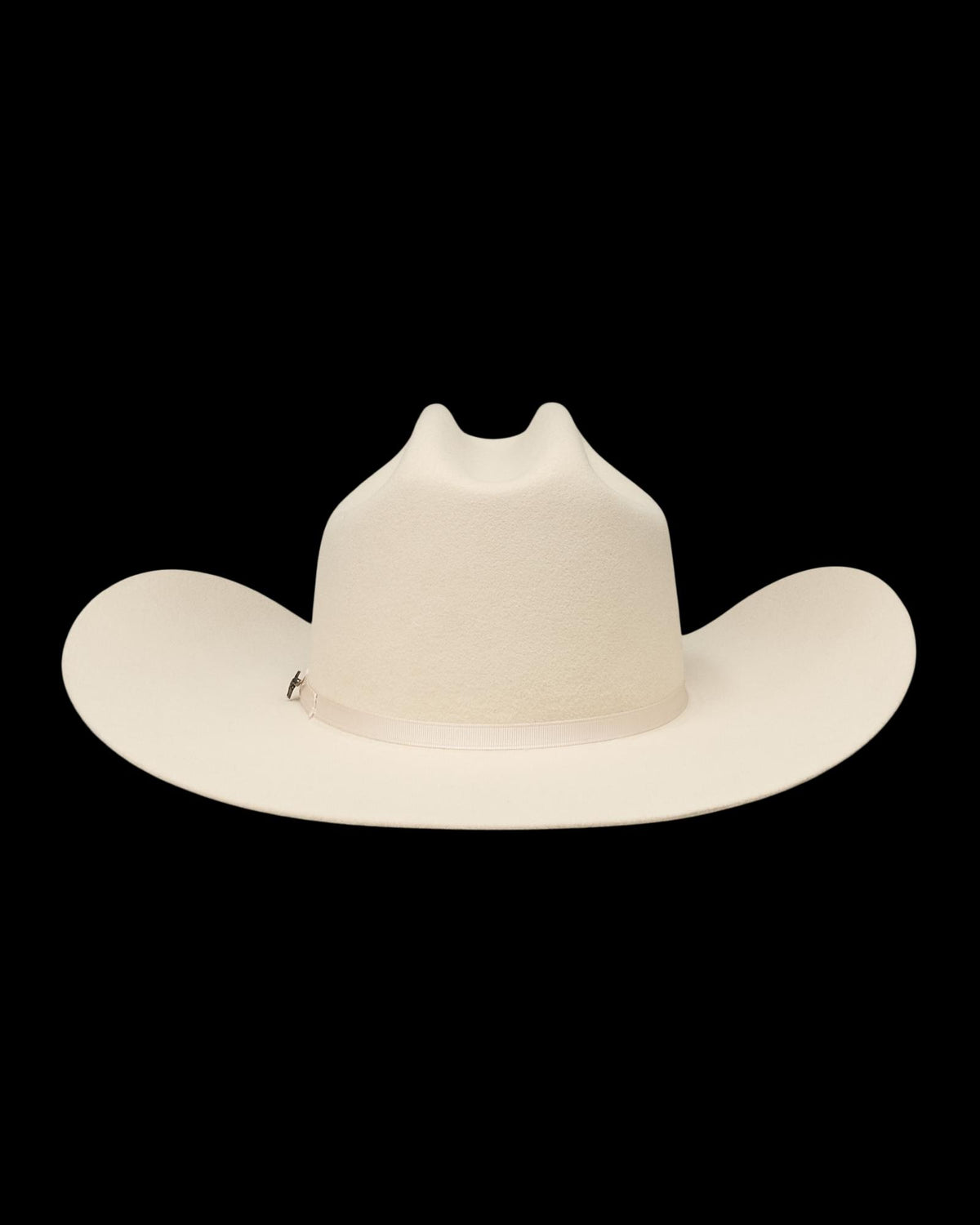 A wide-brimmed, light beige cowboy hat with a creased crown, displayed against a plain white background.