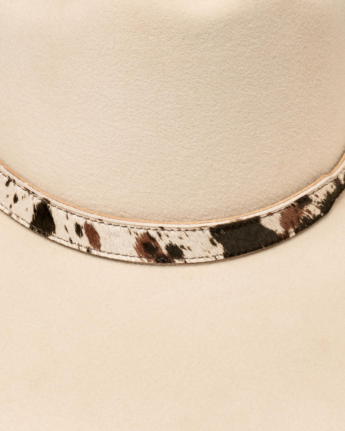 Closeup view of Hair on Hide Buckle Hat Band - Brown Multi