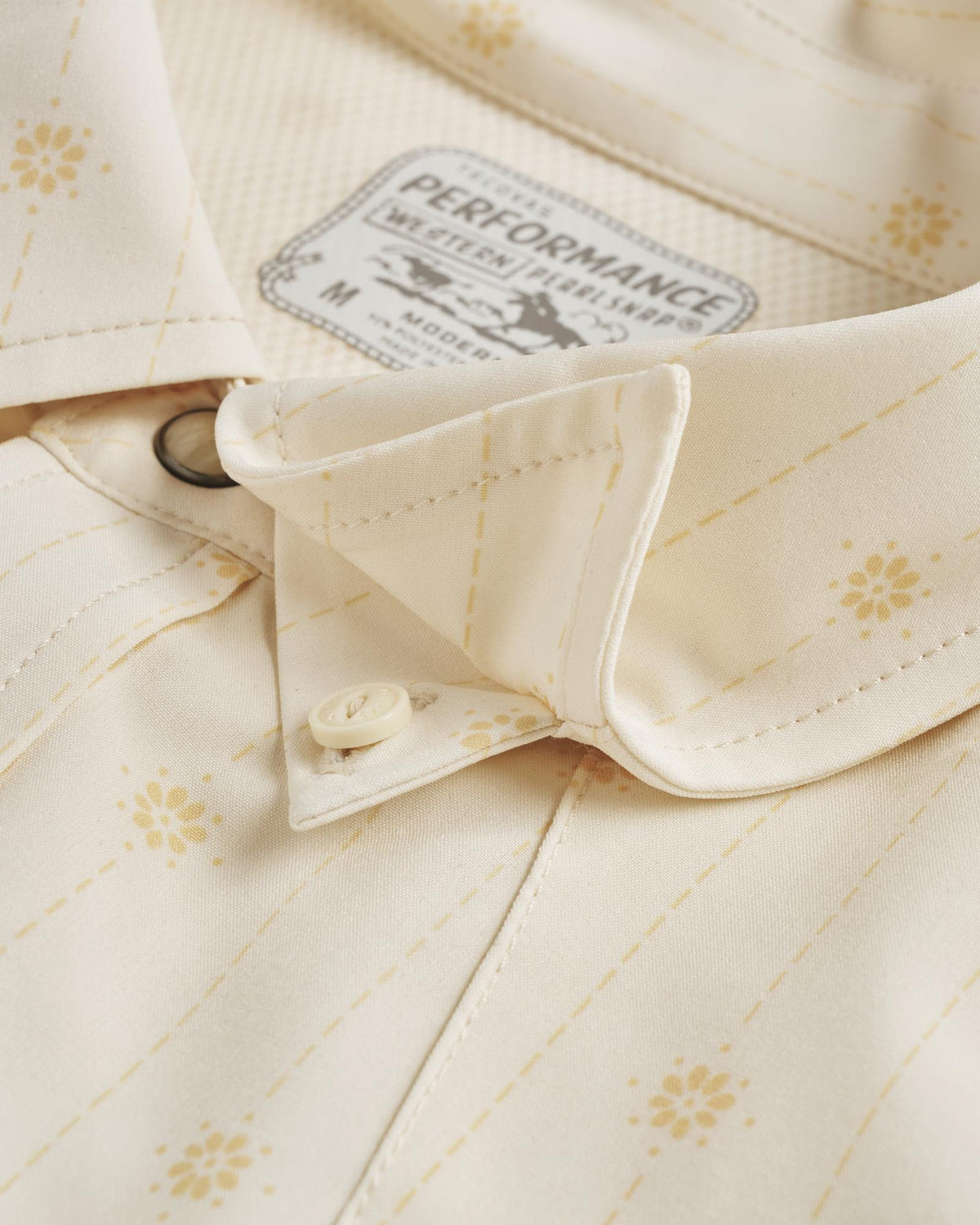 Closeup detail view of Men's Performance Western Short Sleeve Pearl Snap - Light Sand/Multi