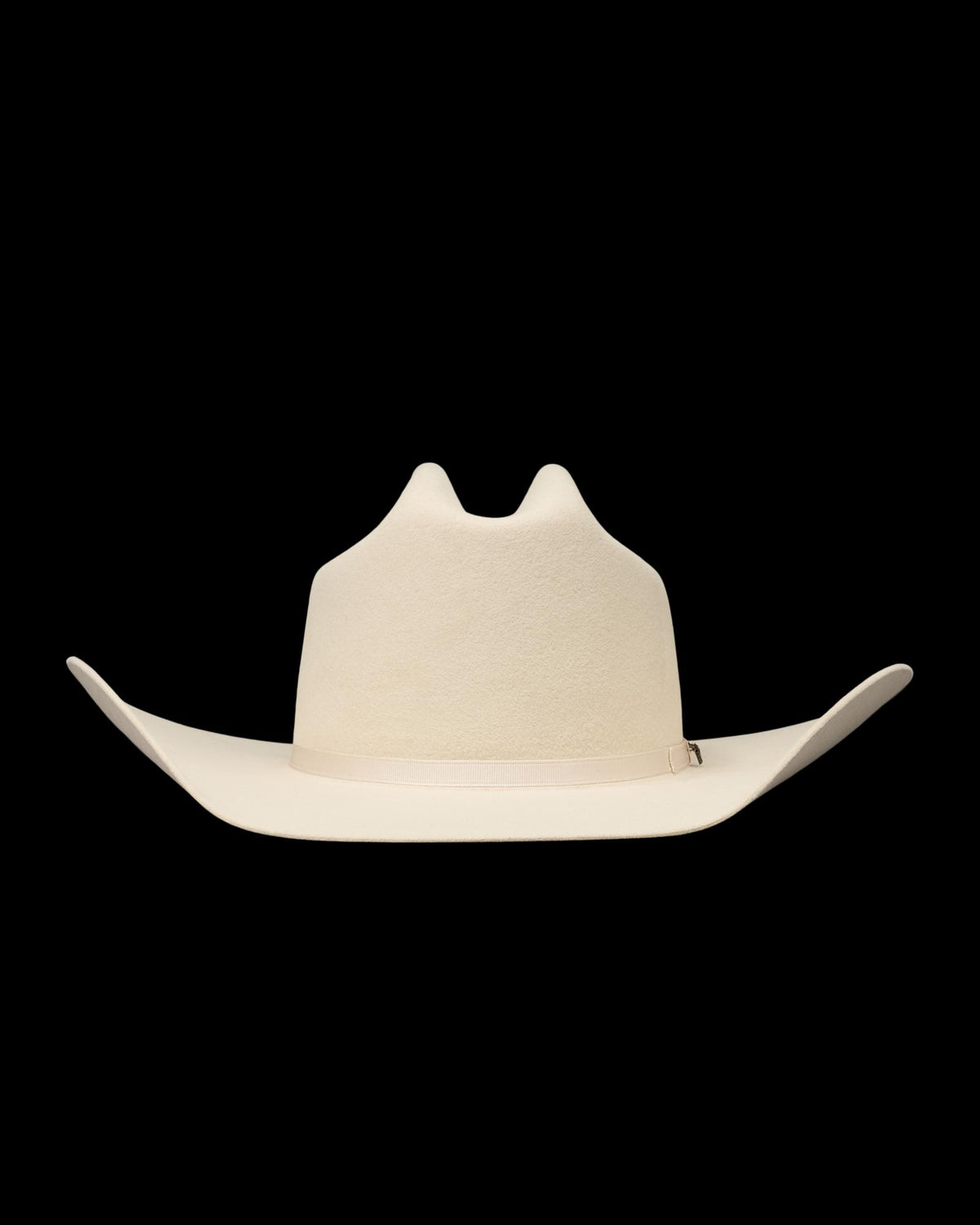 A wide-brimmed, light beige cowboy hat with a tall crown and upturned sides, displayed on a plain white background.