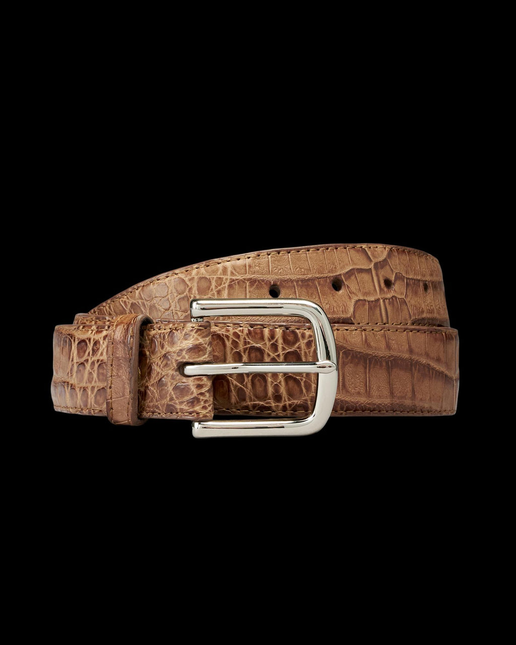 Brown leather belt with a crocodile pattern and a silver rectangular buckle, coiled on a plain white background.