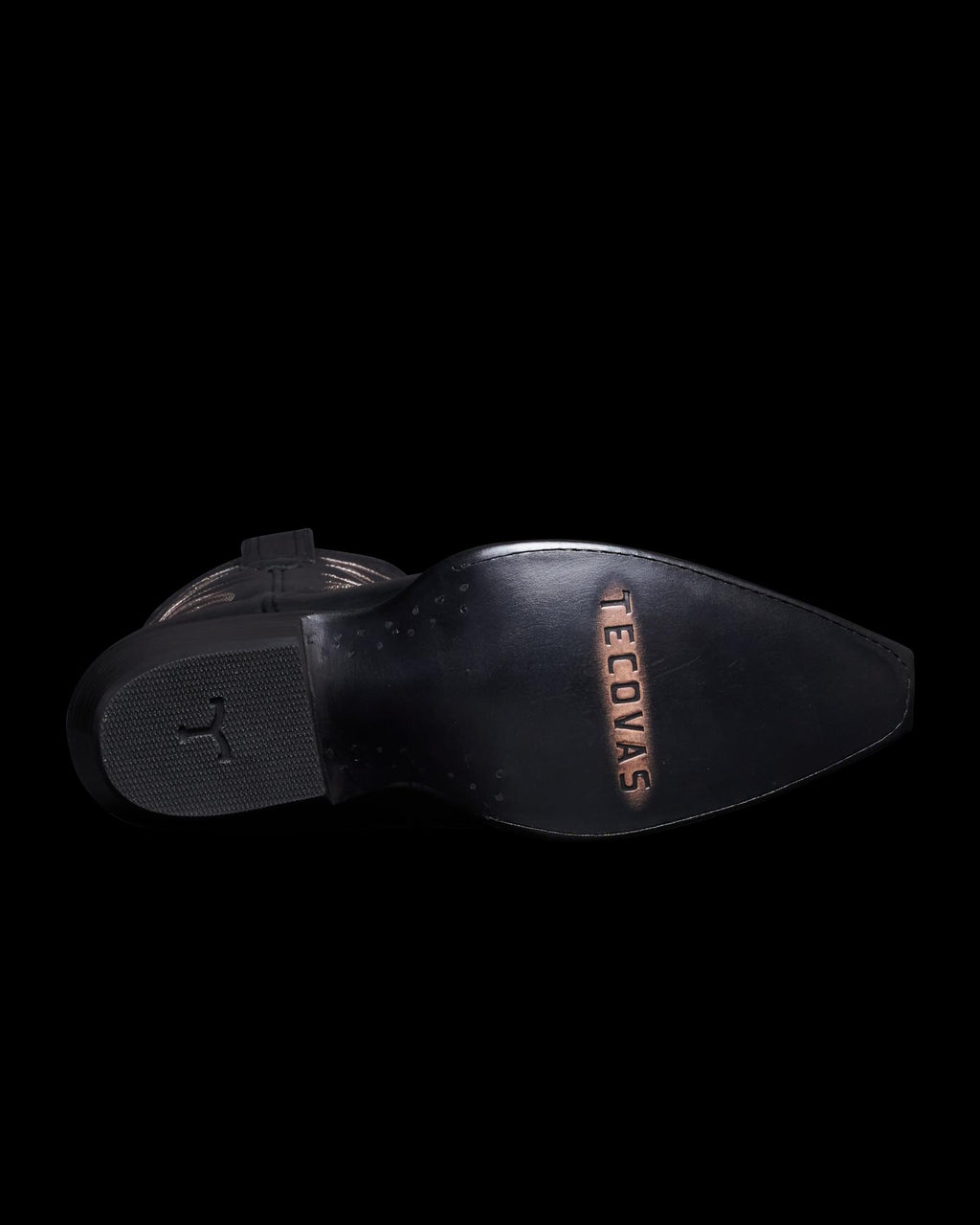 View of the sole on the sadie boot in the color midnight. 