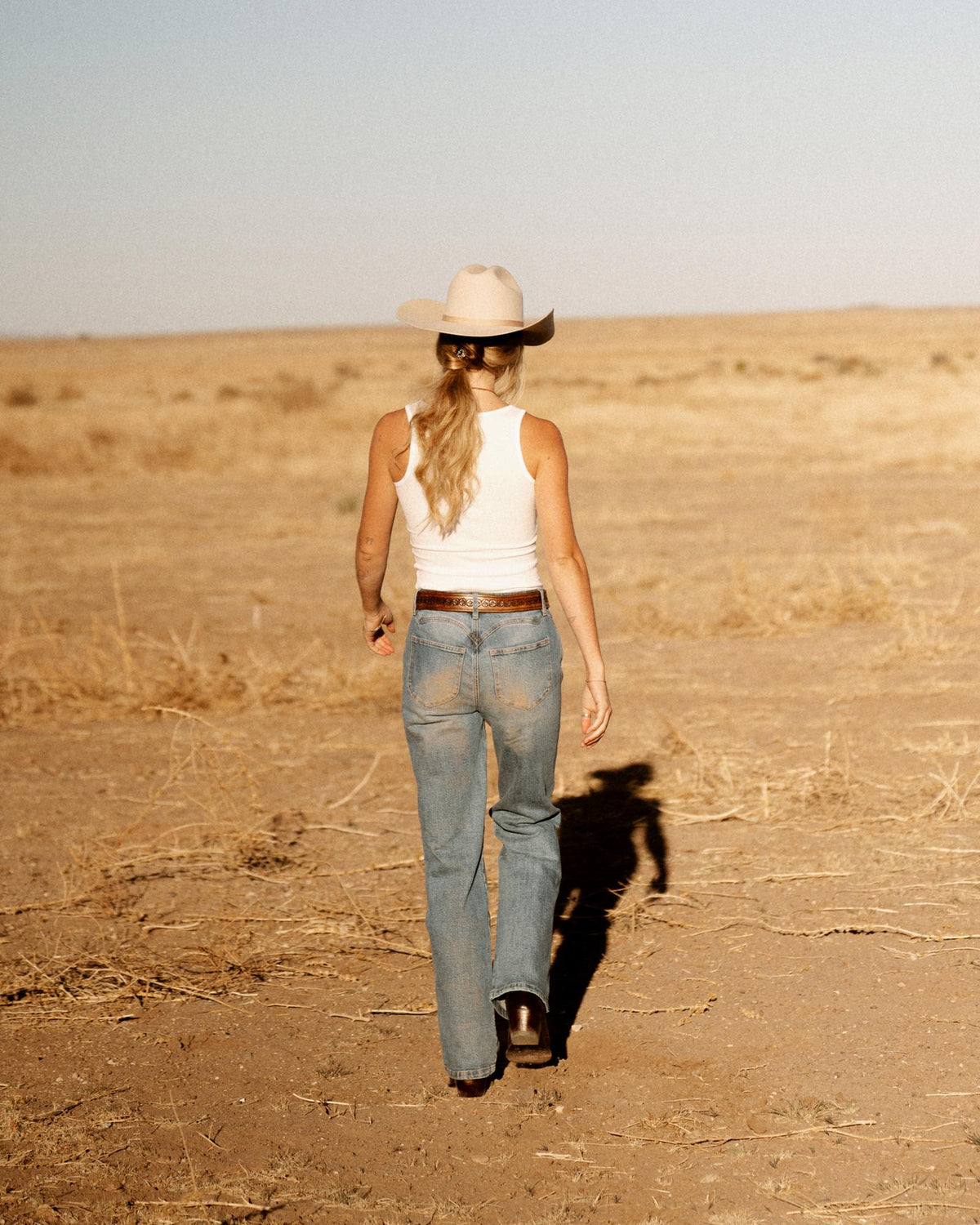 Knitwear styled with a denim shirt