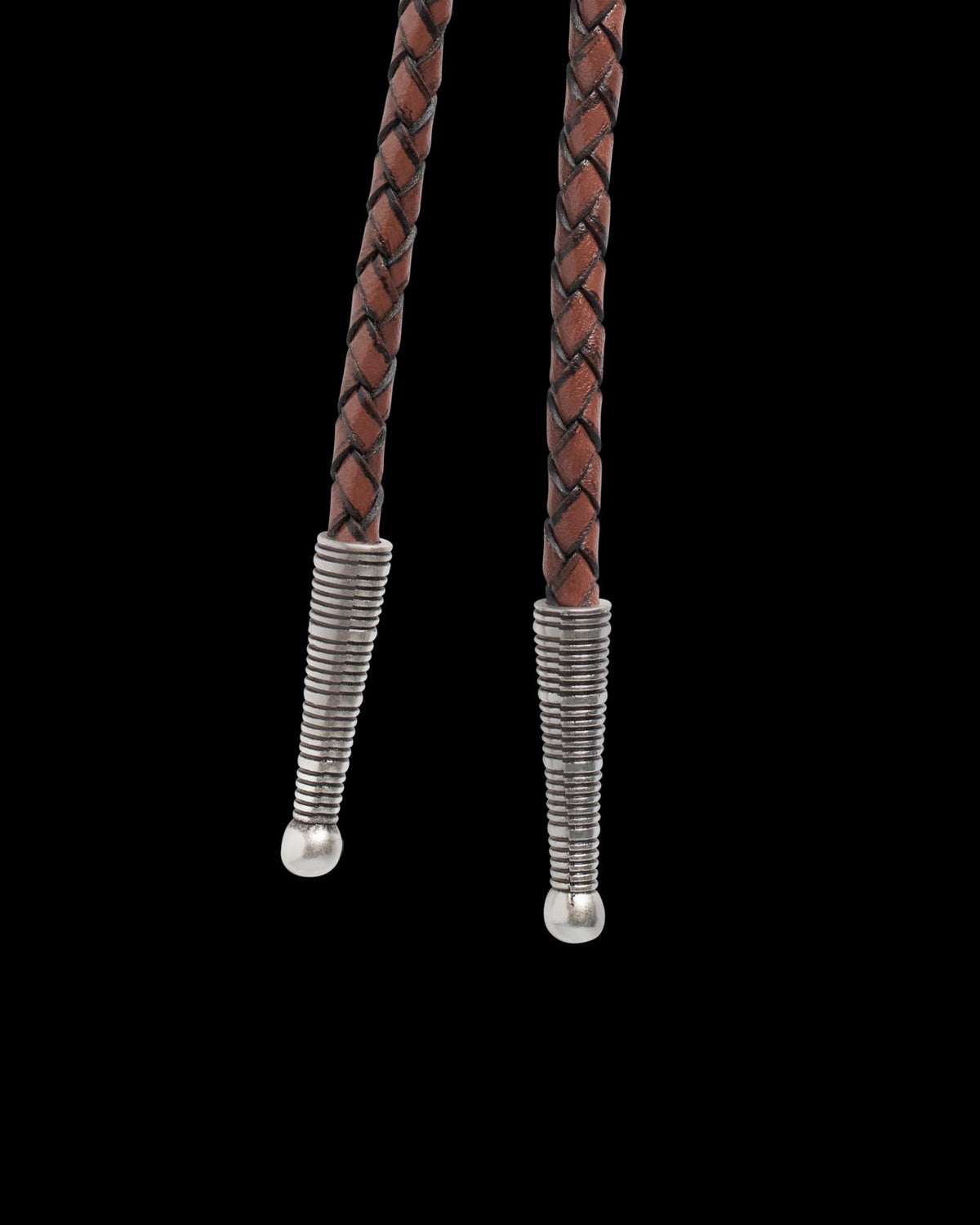 Closeup view of Iron Lamb Turquoise Drop Bolo - Turquoise/Brown