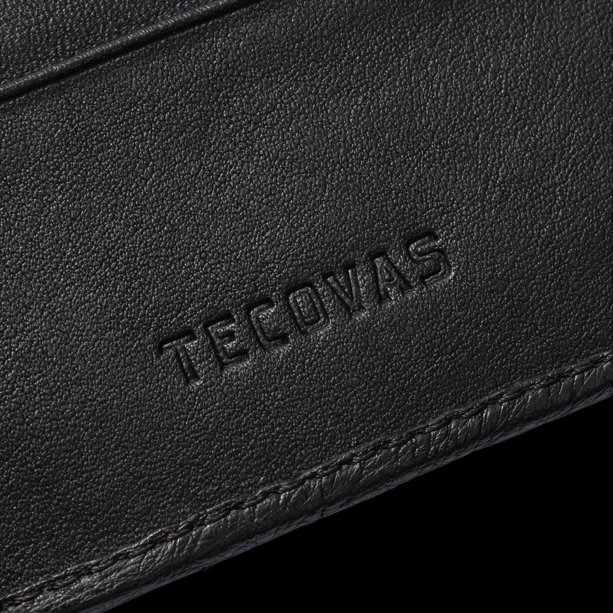 Closeup detail view of Ostrich Billfold - Midnight