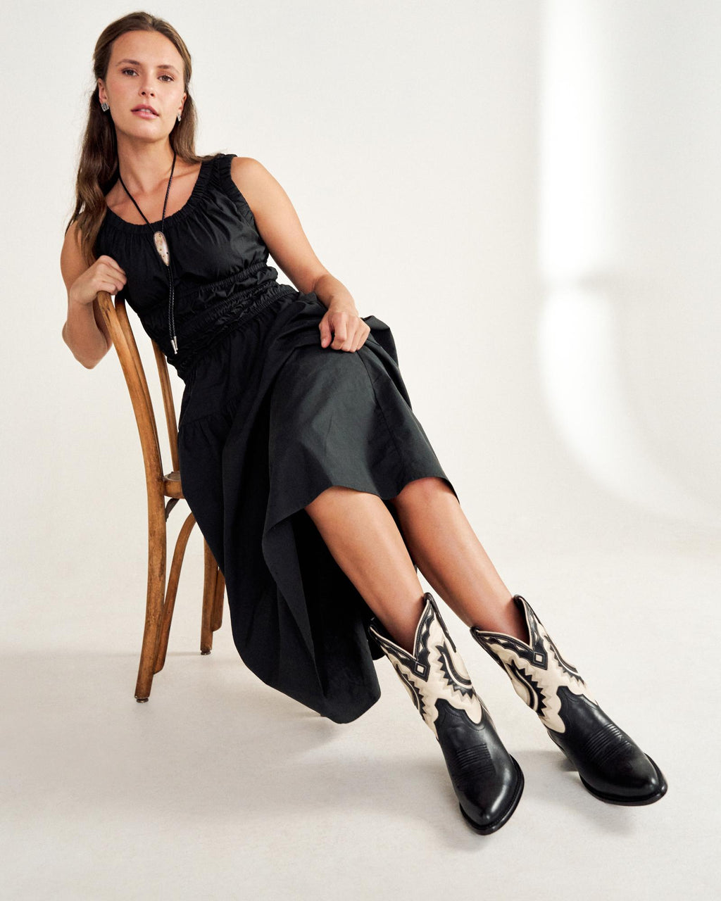 Full view of The Jolene - Midnight / Bone on model