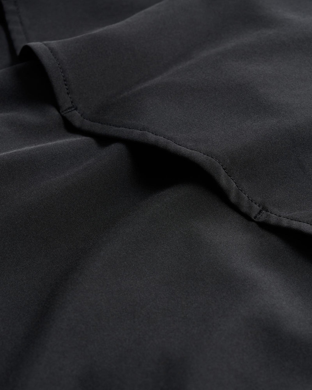 Closeup detail view of Men's Performance Western Pearl Snap LS - Black