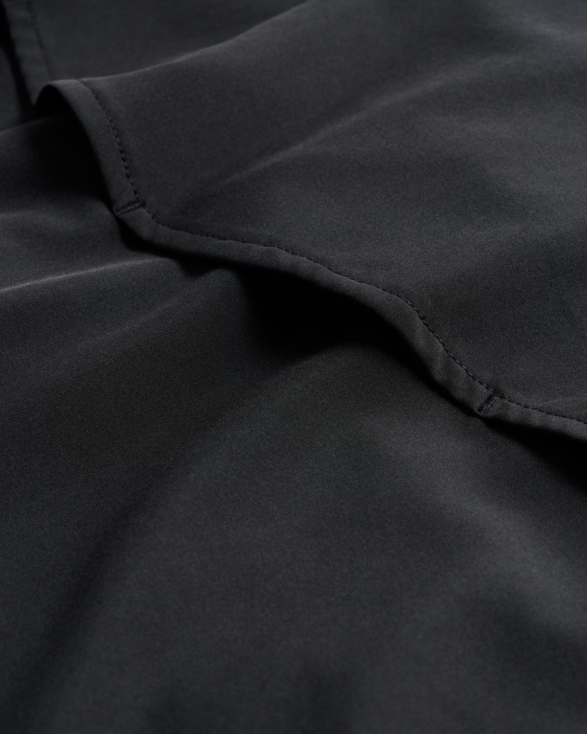 Closeup detail view of Men's Performance Western Pearl Snap LS - Black