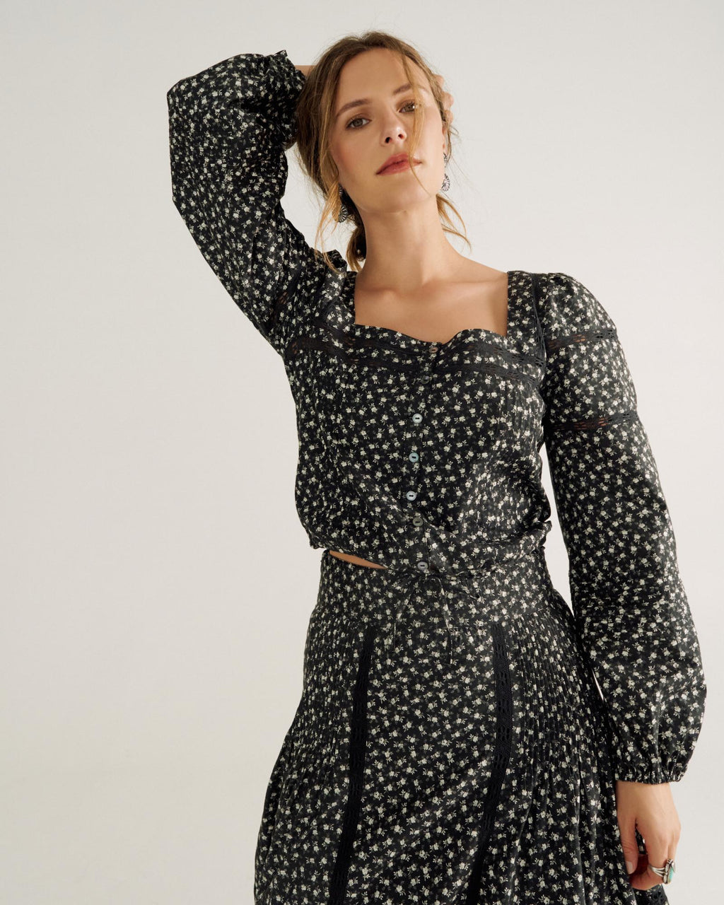 Front view of Women's Long Sleeve Cotton Poplin Top - Black / White on model